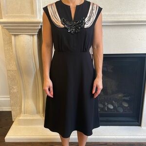 BCBG Black cocktail dress. Size 6. Never worn.